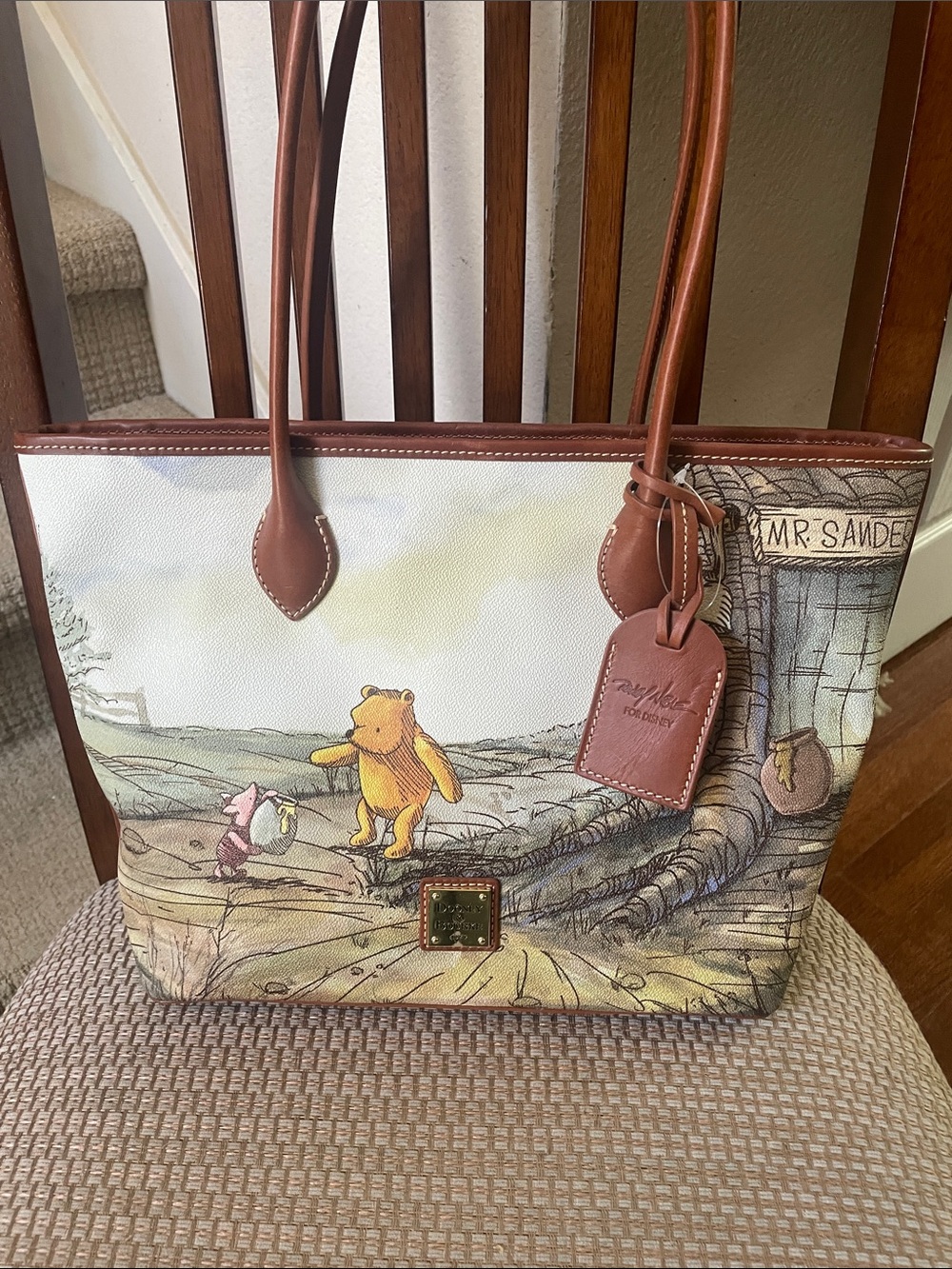 Disney Dooney & Bourke Cream Canvas Winnie the Pooh Scene Tote with Brown Trim